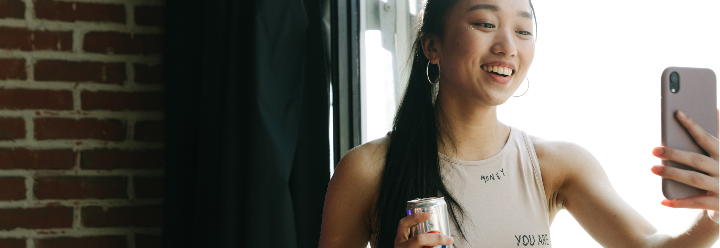 A woman speaking into a cell phone